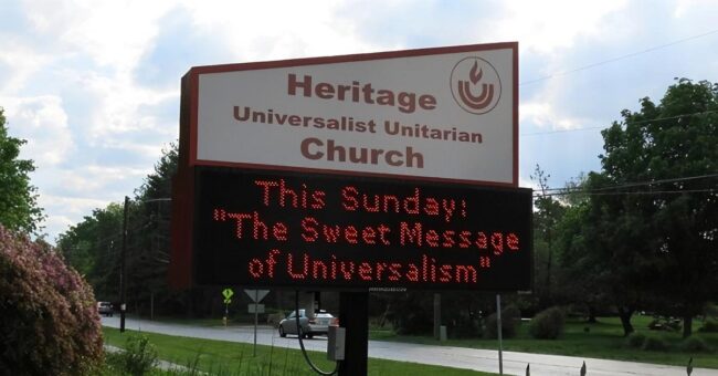 Photograph of the Heritage Uu Church roadside sign, displaying the message "This Sunday: 'The Sweet Message of Universalism'"